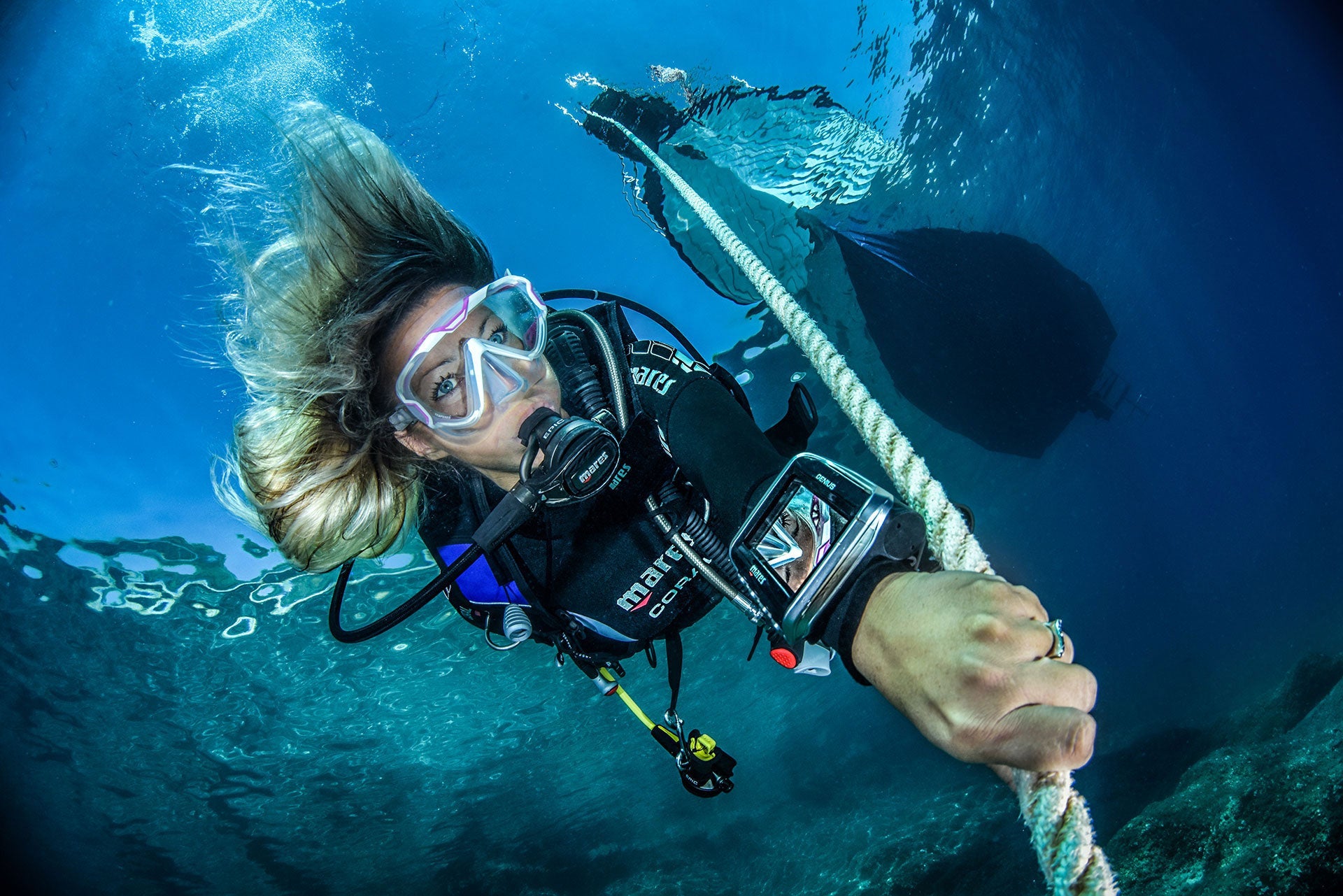 Floating Rope Diving woman scuba diving along rope