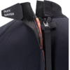Close-up of a black backpack with a strap and zipper detail.