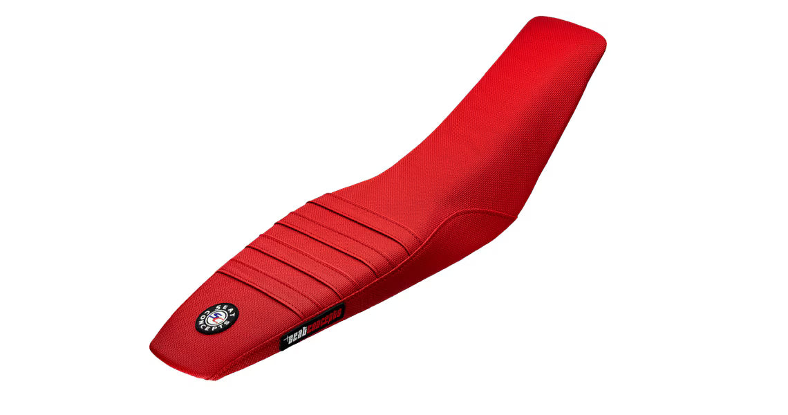 Red motorcycle seat with a brand logo on a white background