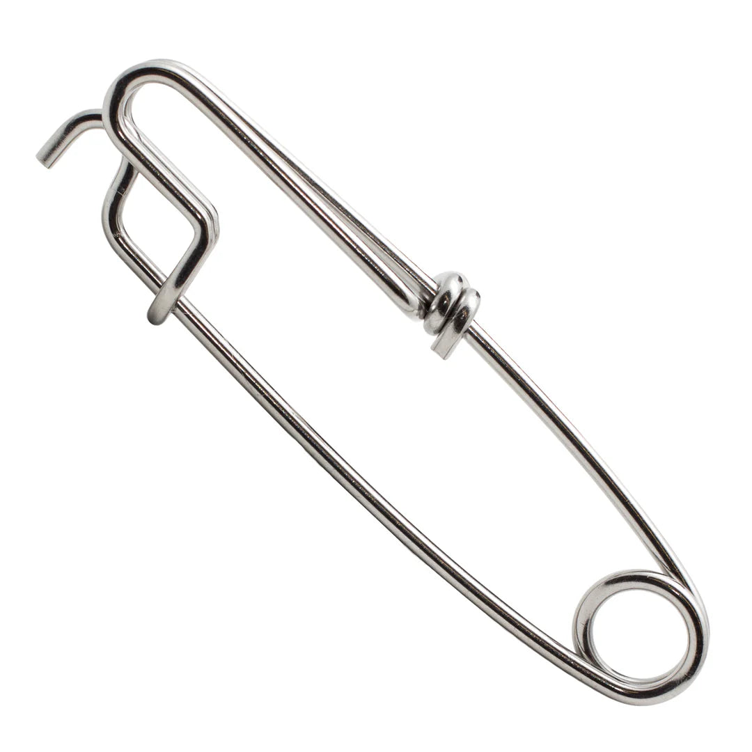 Metal safety pin on a white background