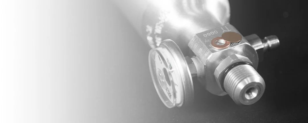 Close-up of a mechanical valve or pump component on a dark background