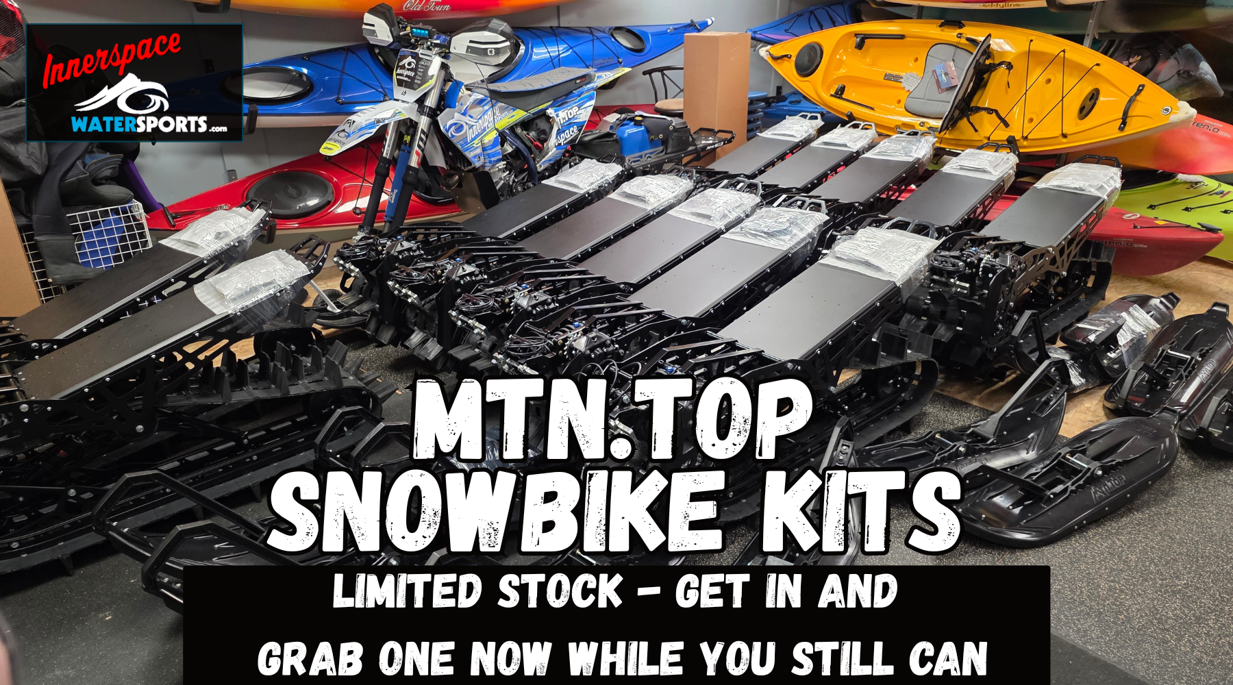 Snow bike kits on display with promotional text and InnerSpace Watersports logo.