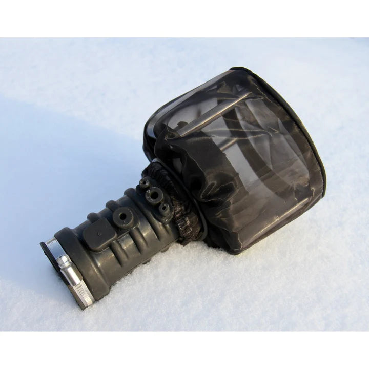 Black underwater flashlight with clear lens on a light blue background