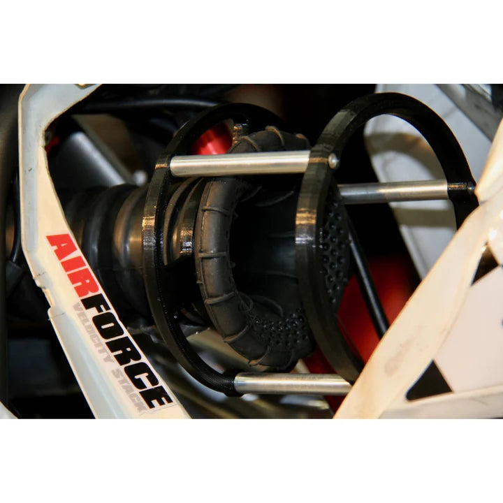 Close-up of a motorcycle suspension system with 'Air Force' branding.