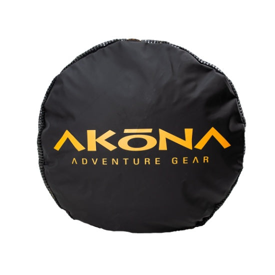 Black tire cover with 'Akona Adventure Gear' logo on a white background