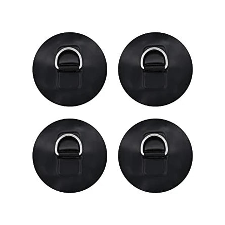 Four black circular objects with metallic rings on a white background