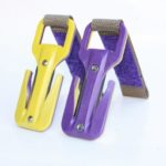 Two purple and yellow tools on a white background