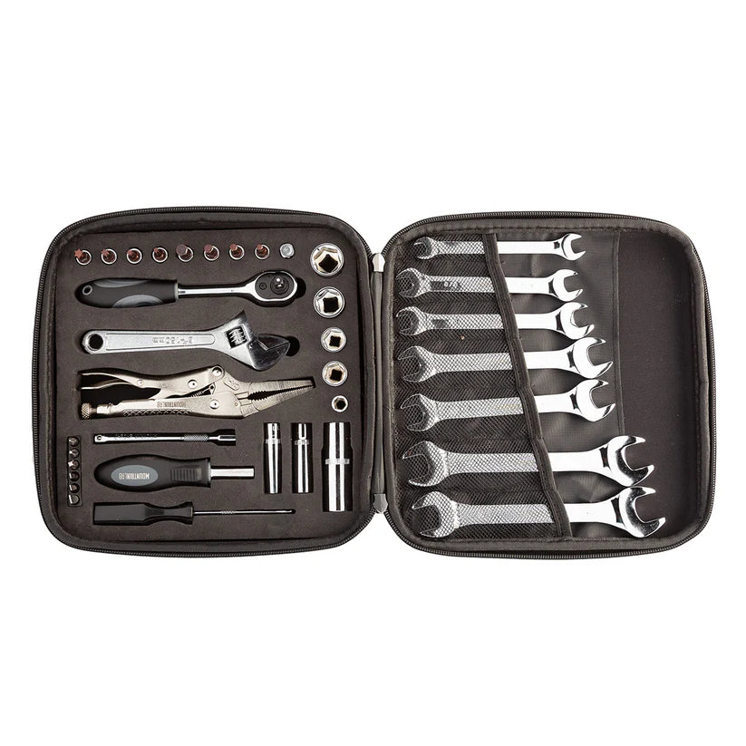Open tool case with various tools including wrenches and screwdrivers on a white background