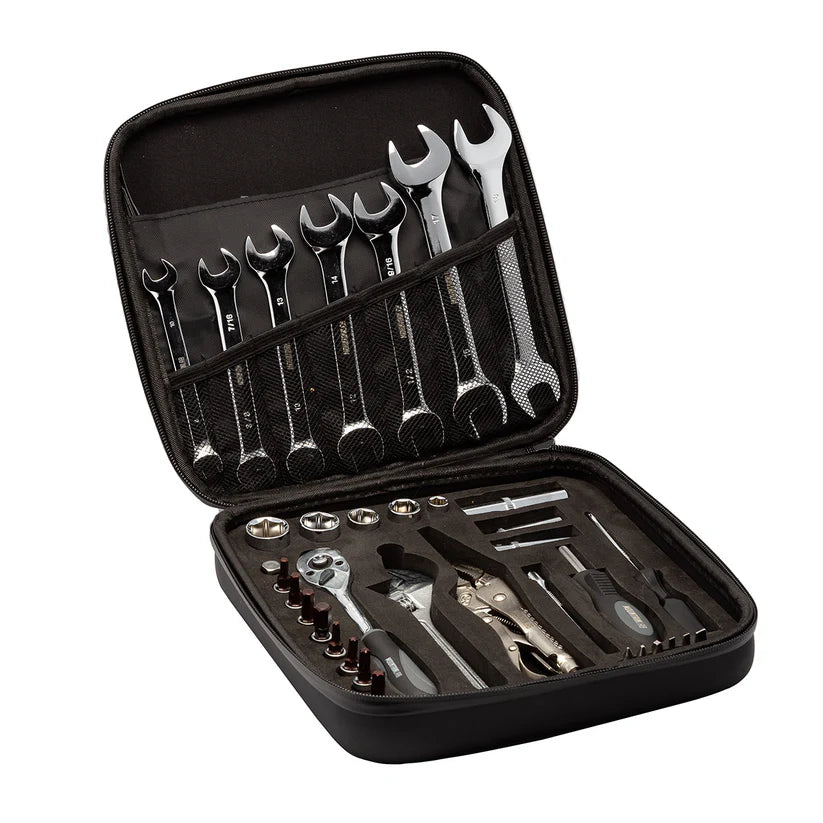 Open tool case with various tools including wrenches and screwdrivers on a white background