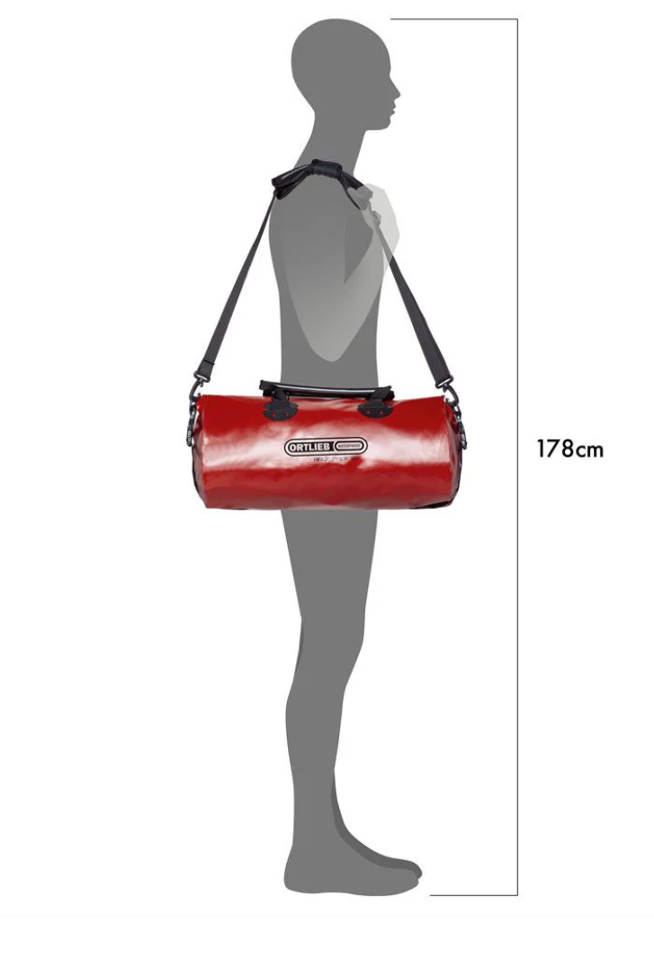 Red duffel bag with black straps on a gray mannequin, showing size measurement.