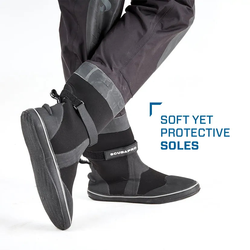 Black waterproof boots with protective soles on a white background