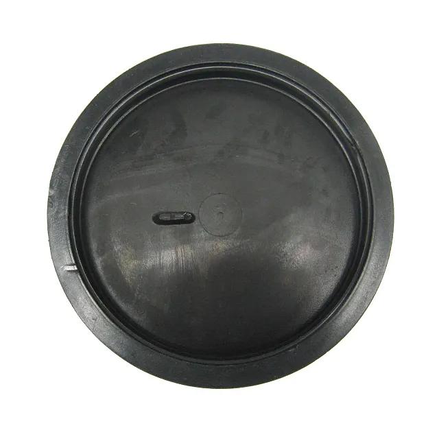 A round black rubber gasket or seal with a raised rim and a small central tab, shown against a plain white background.