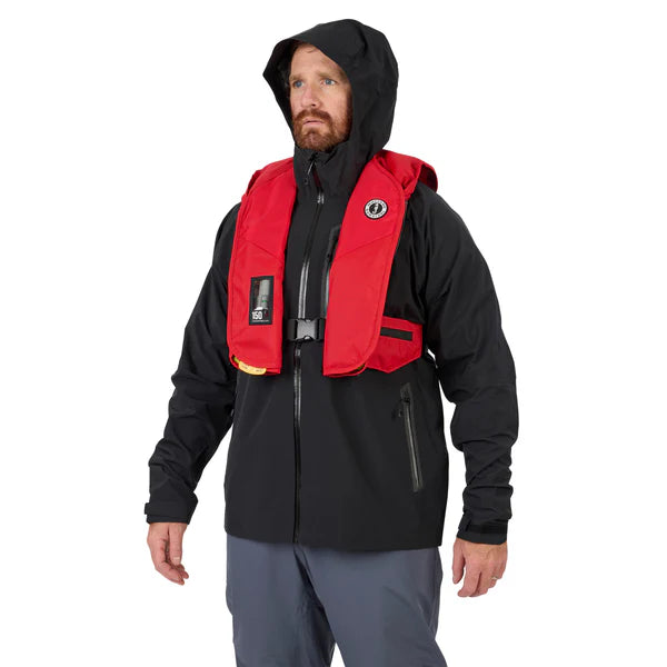 Person wearing a black jacket with a red life vest on a white background