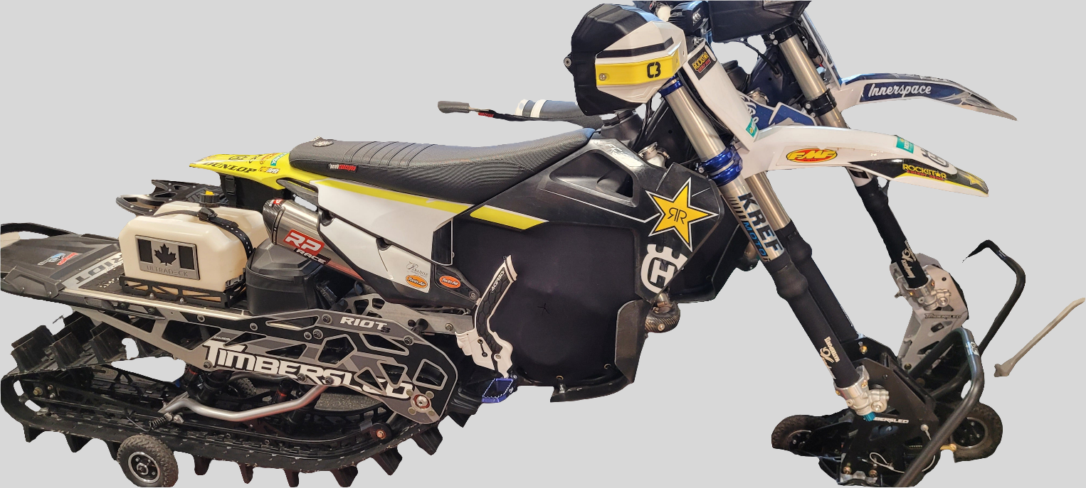 Motorcycle with snow chains on a gray background