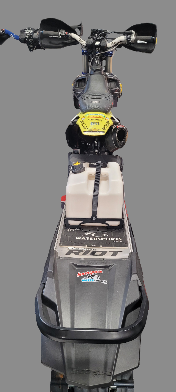 Motorized scooter with 'Riot' branding on a gray background