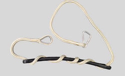 Black and gold dog toy with a rope on a gray background