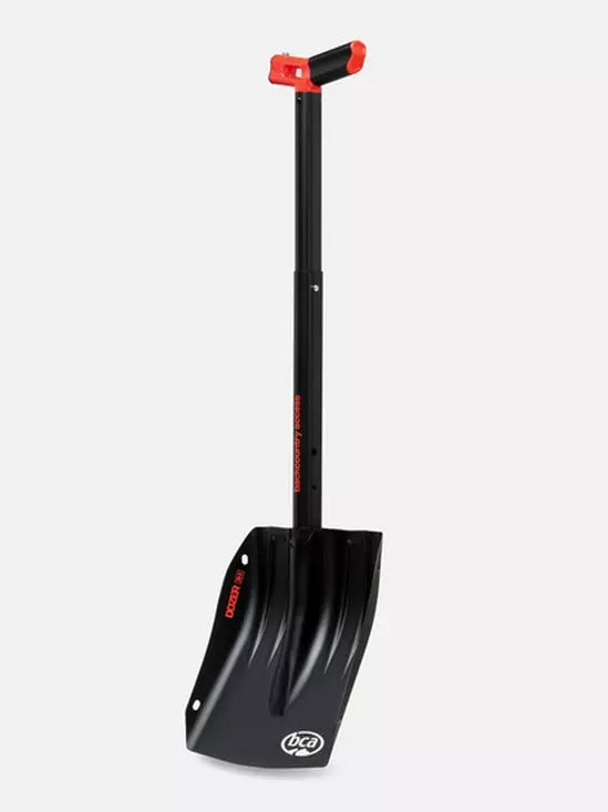 Black snow shovel with red accents on a white background