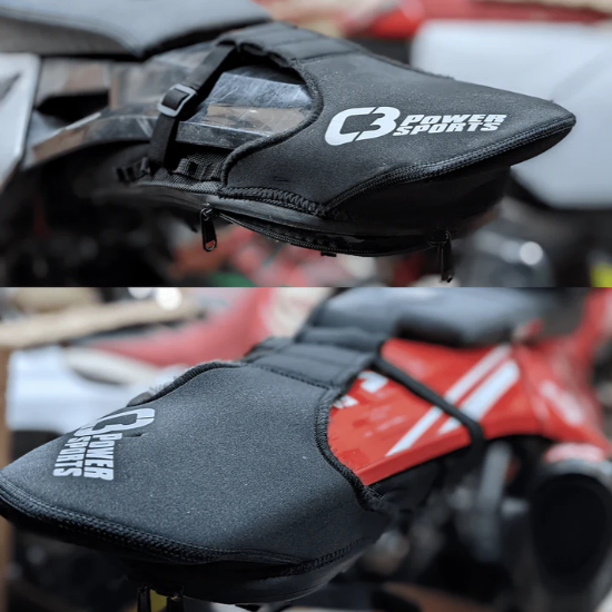 Black motorcycle seat cover with 'C3 Power Sports' branding on a blurred background.