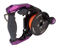 Fishing reel with purple and black handle on a white background