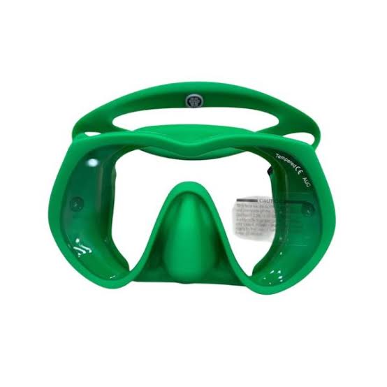 A bright green full-face snorkeling mask with a wide strap and a small attached white instruction card, shown against a plain white background.