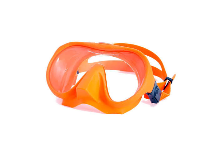 Bright orange diving mask with a clear lens and adjustable strap, shown on a plain white background.