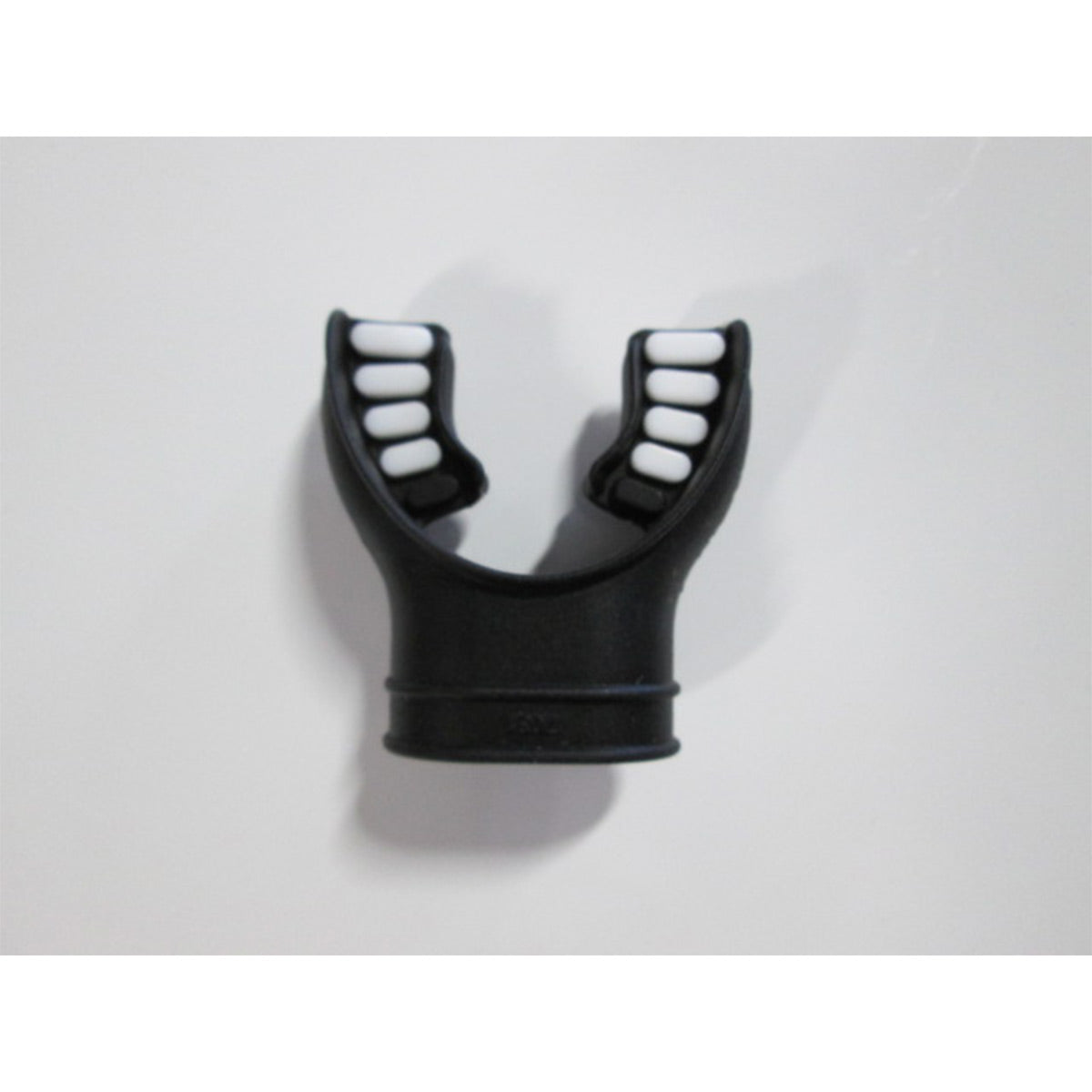 Black mouthguard with white interior on a light gray background