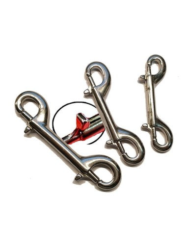 Metal clip with red interior on a white background