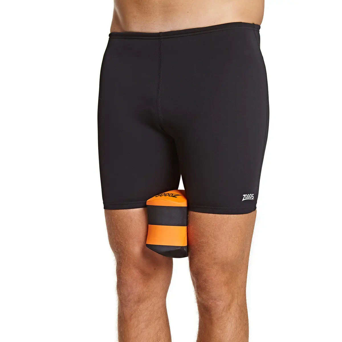 Black swim shorts with orange and black bag on a white background