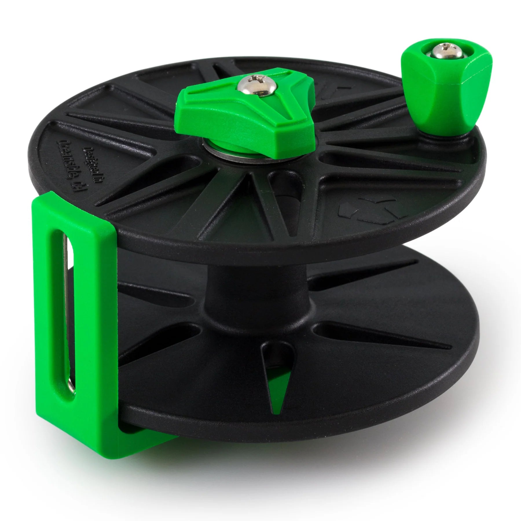 Black and green reel with a white background