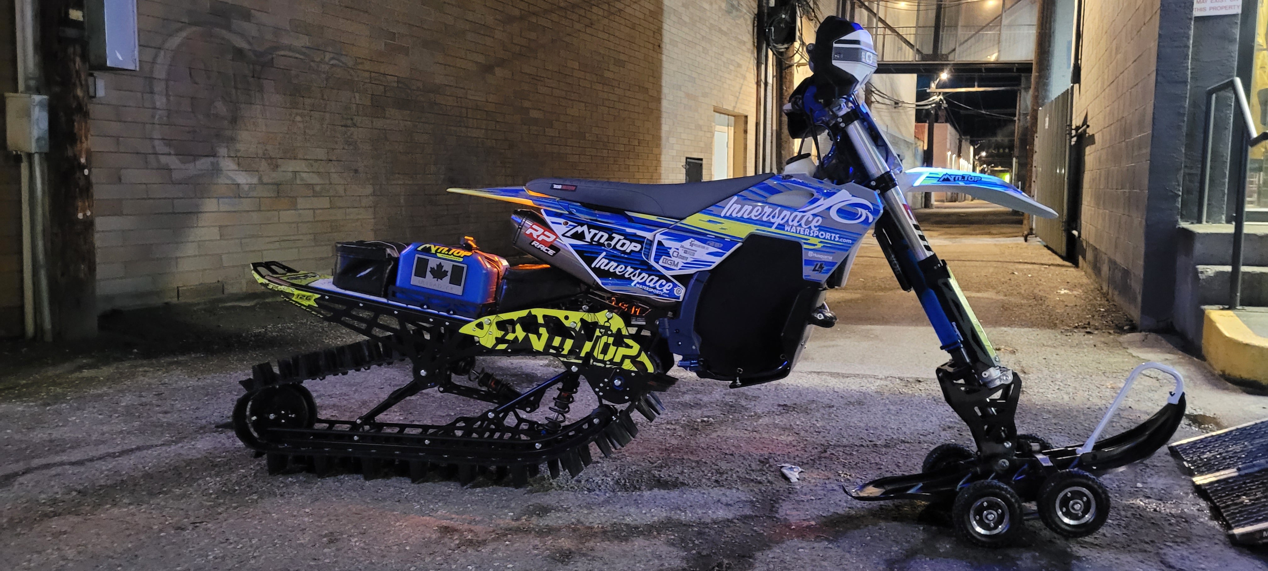 snowbike with MTN.Top kit in back alley